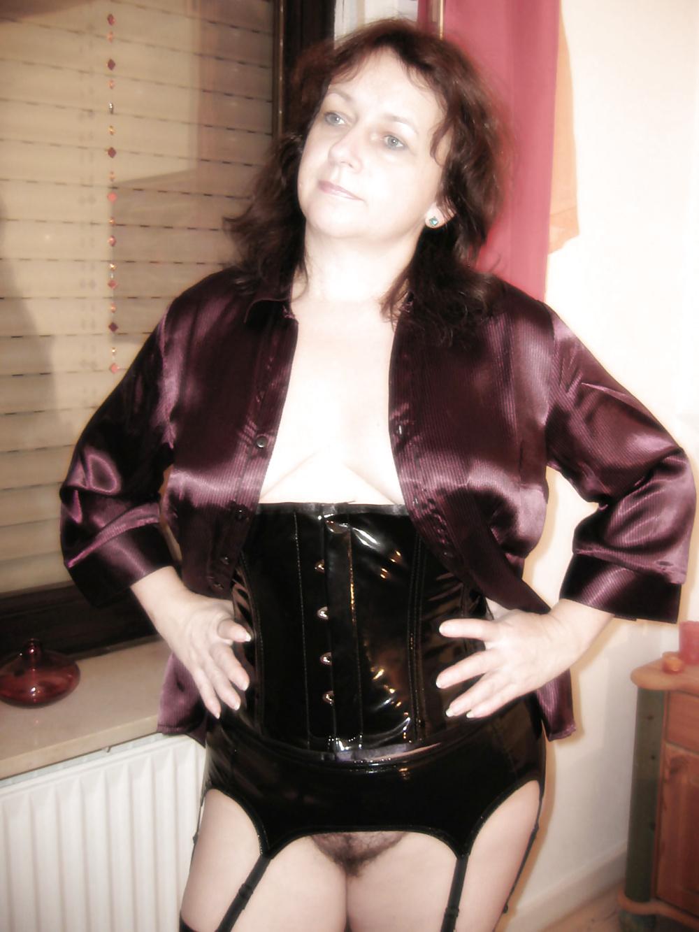 16P Hairy MILF wearing a PVC Corset