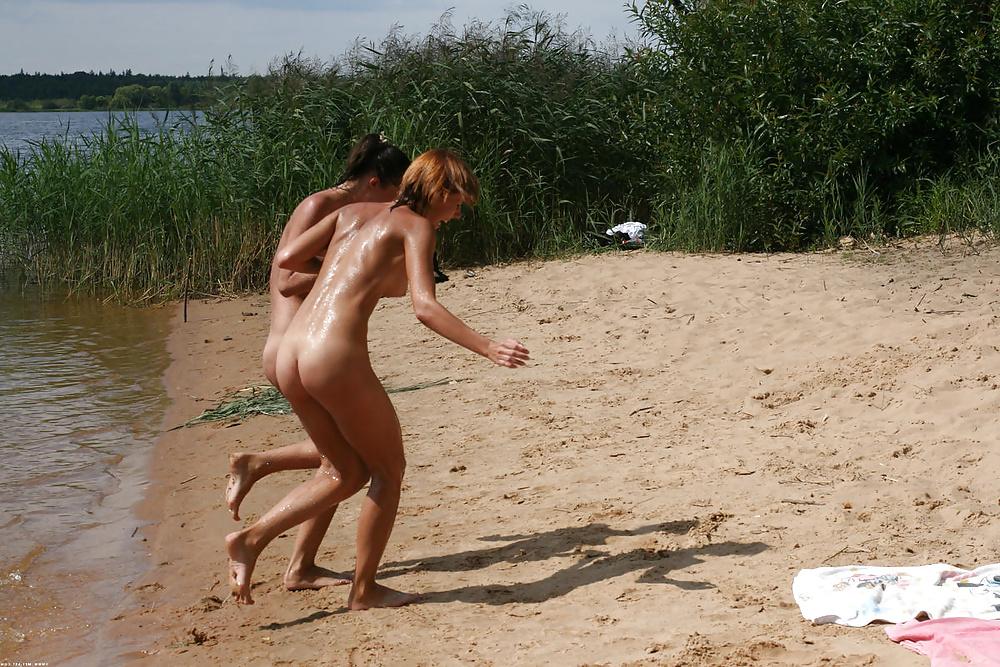 23P Nudists at the lake.