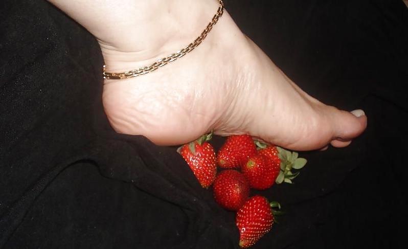 25P Girls feet covered in food