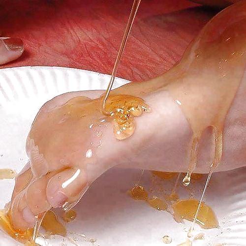 25P Girls feet covered in food