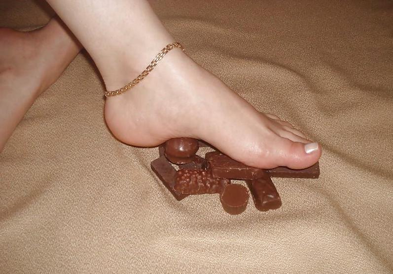 25P Girls feet covered in food