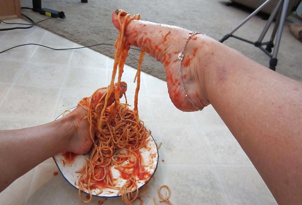 25P Girls feet covered in food