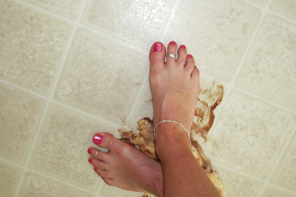 25P Girls feet covered in food