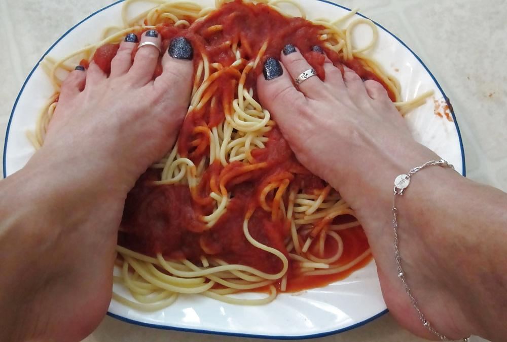 25P Girls feet covered in food