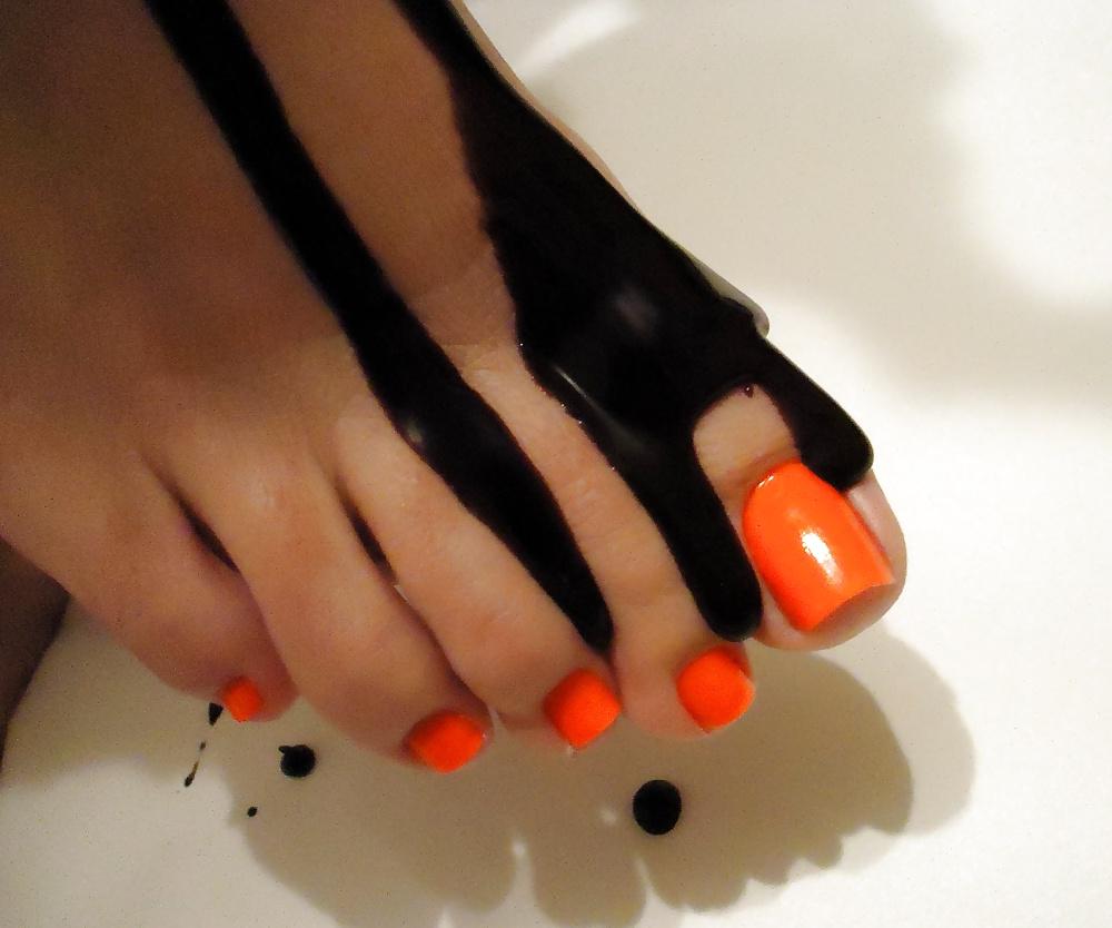 25P Girls feet covered in food