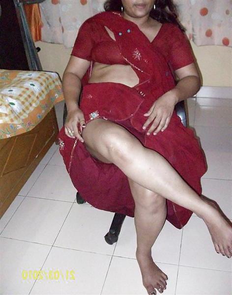 25P Indian aunty stripping 1