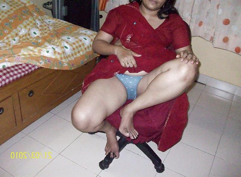 25P Indian aunty stripping 1