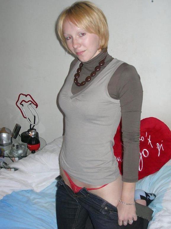 25P Blonde Cutie posing on her bed