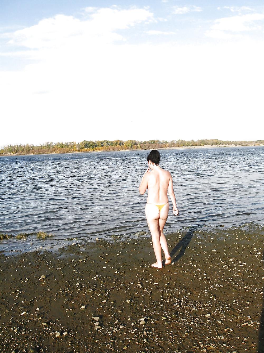 16P Lili on the beach topless in yellow panties