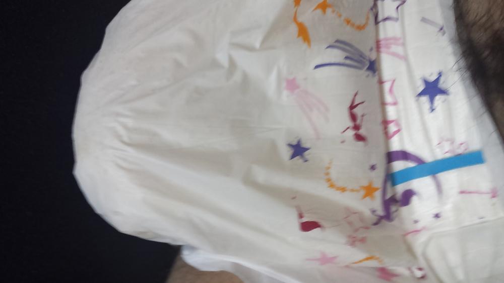 25P Wearing my girly pink and purple diaper.