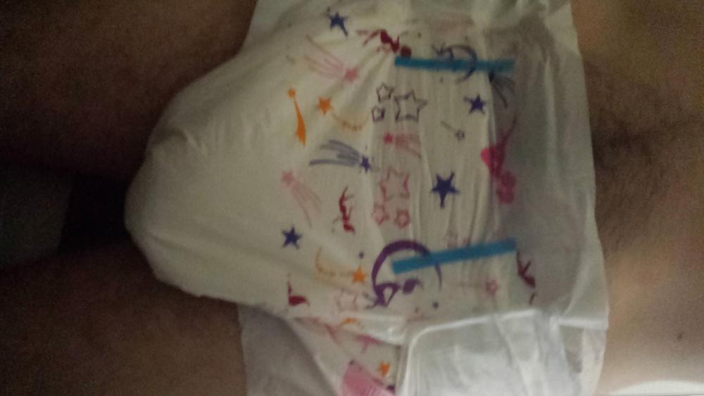 25P Wearing my girly pink and purple diaper.