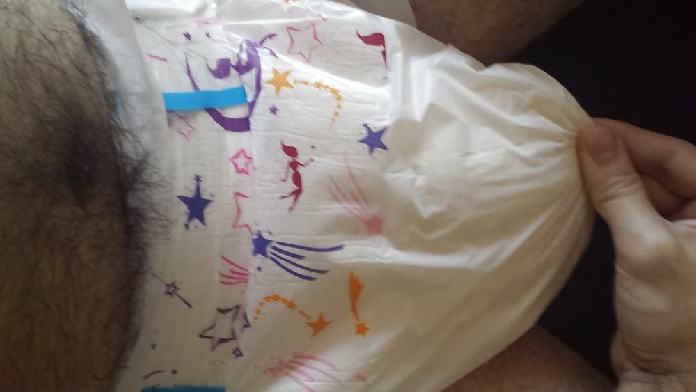 25P Wearing my girly pink and purple diaper.