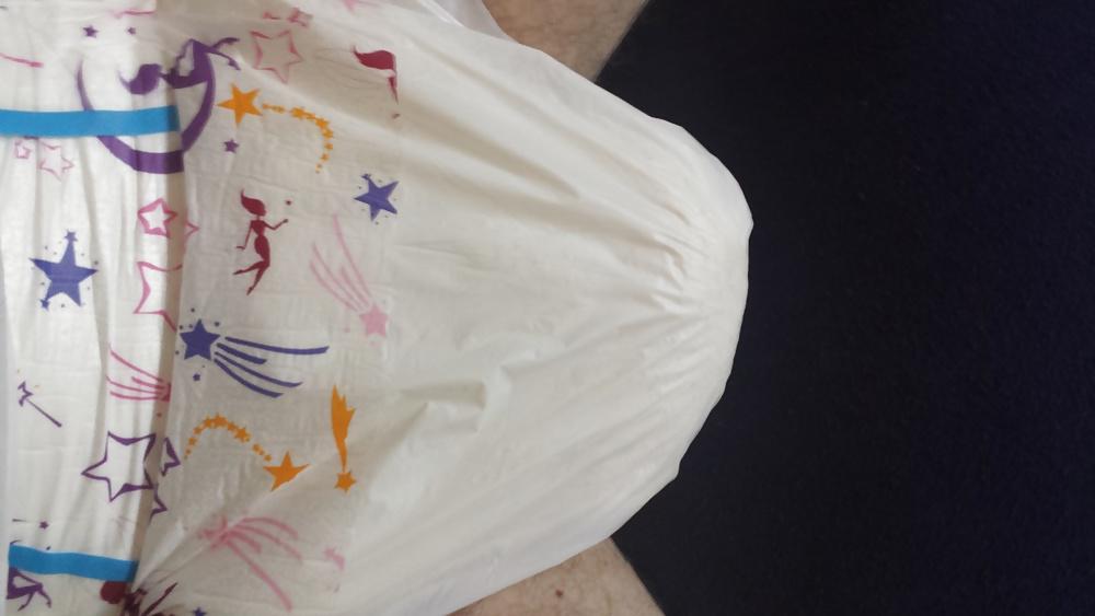 25P Wearing my girly pink and purple diaper.