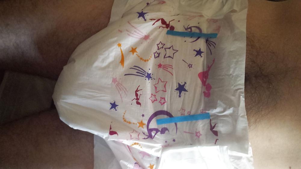 25P Wearing my girly pink and purple diaper.