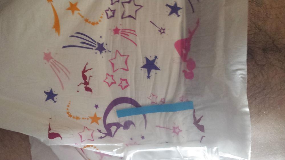 25P Wearing my girly pink and purple diaper.