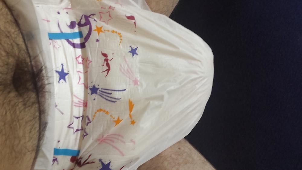 25P Wearing my girly pink and purple diaper.