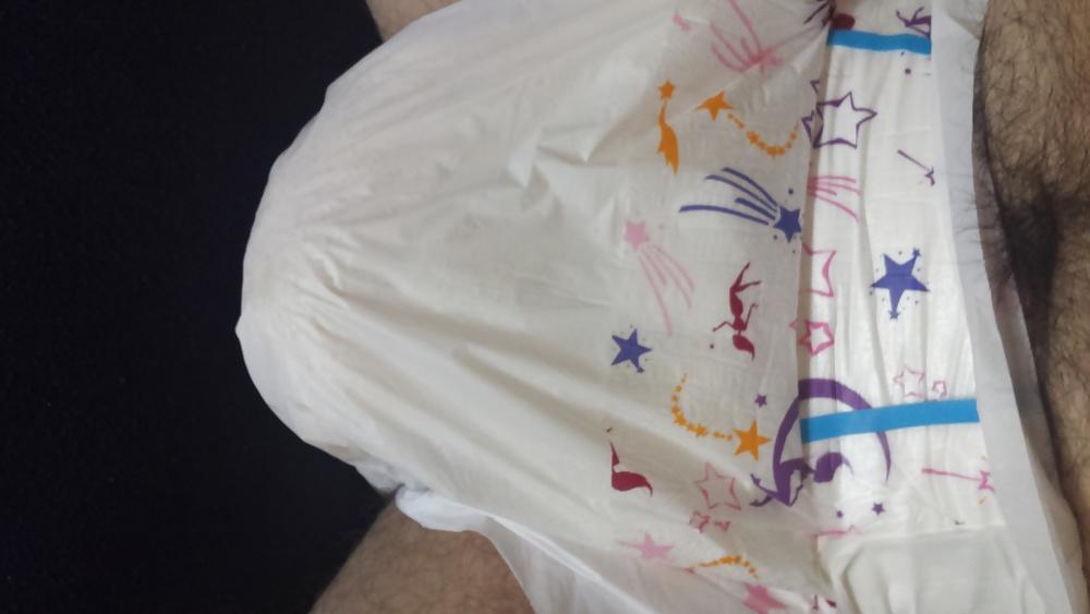 25P Wearing my girly pink and purple diaper.