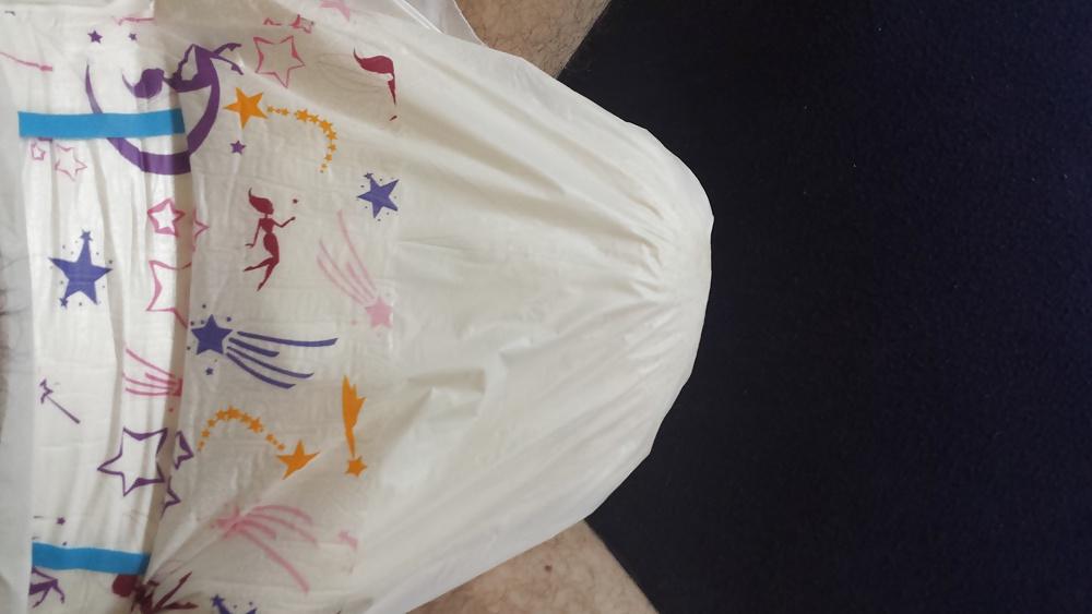 25P Wearing my girly pink and purple diaper.