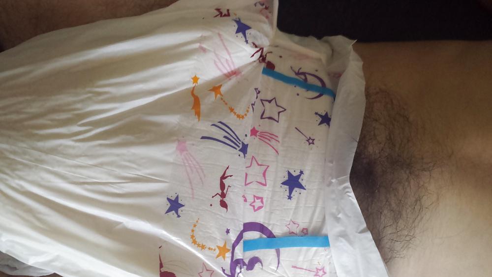 25P Wearing my girly pink and purple diaper.