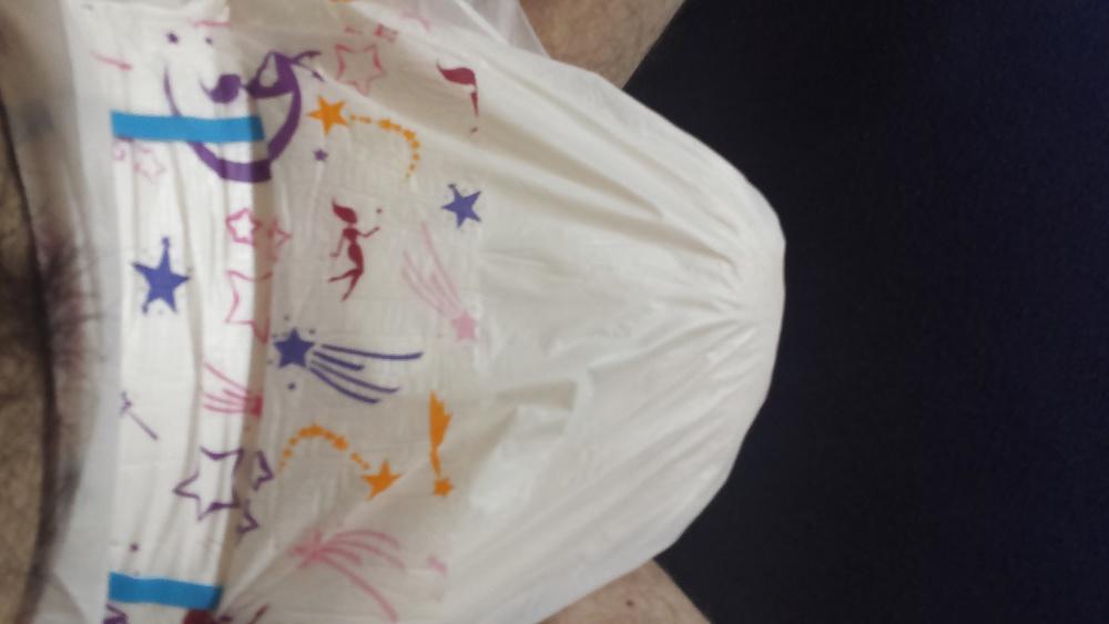 25P Wearing my girly pink and purple diaper.