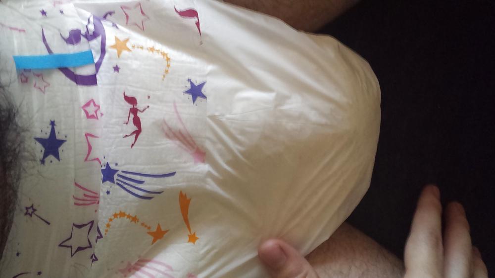 25P Wearing my girly pink and purple diaper.