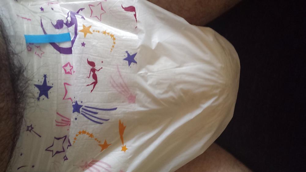 25P Wearing my girly pink and purple diaper.