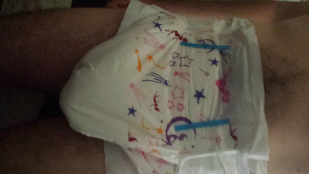 25P Wearing my girly pink and purple diaper.