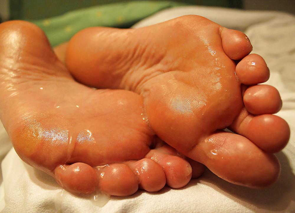 13P Just shot a load on her feet soles.