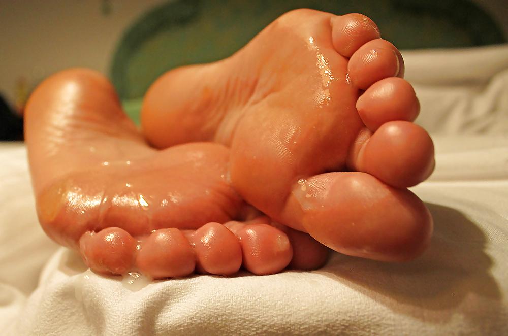 13P Just shot a load on her feet soles.