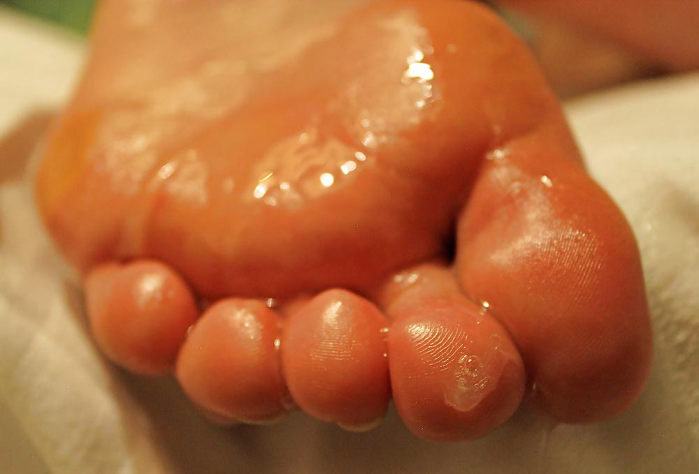 13P Just shot a load on her feet soles.