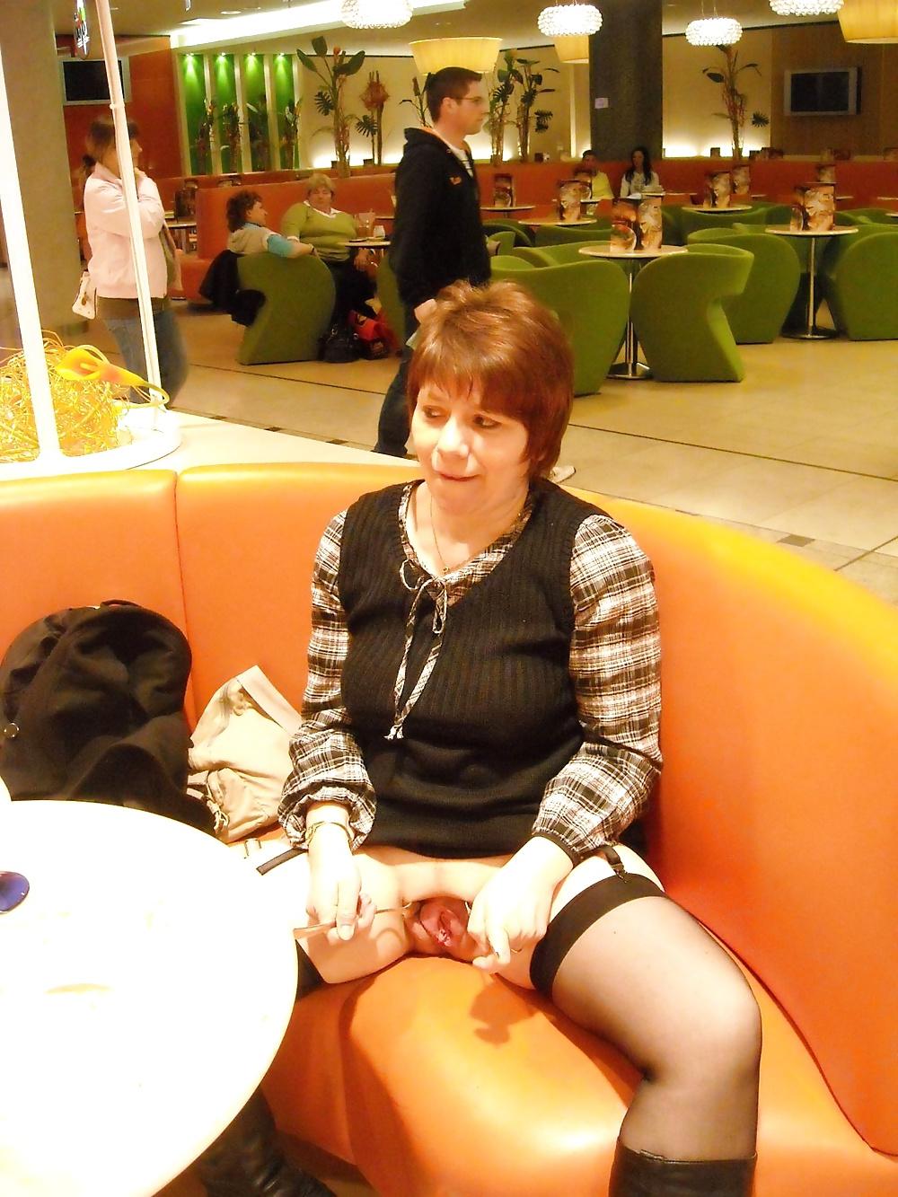 18P Showing Pussy in Restaurant