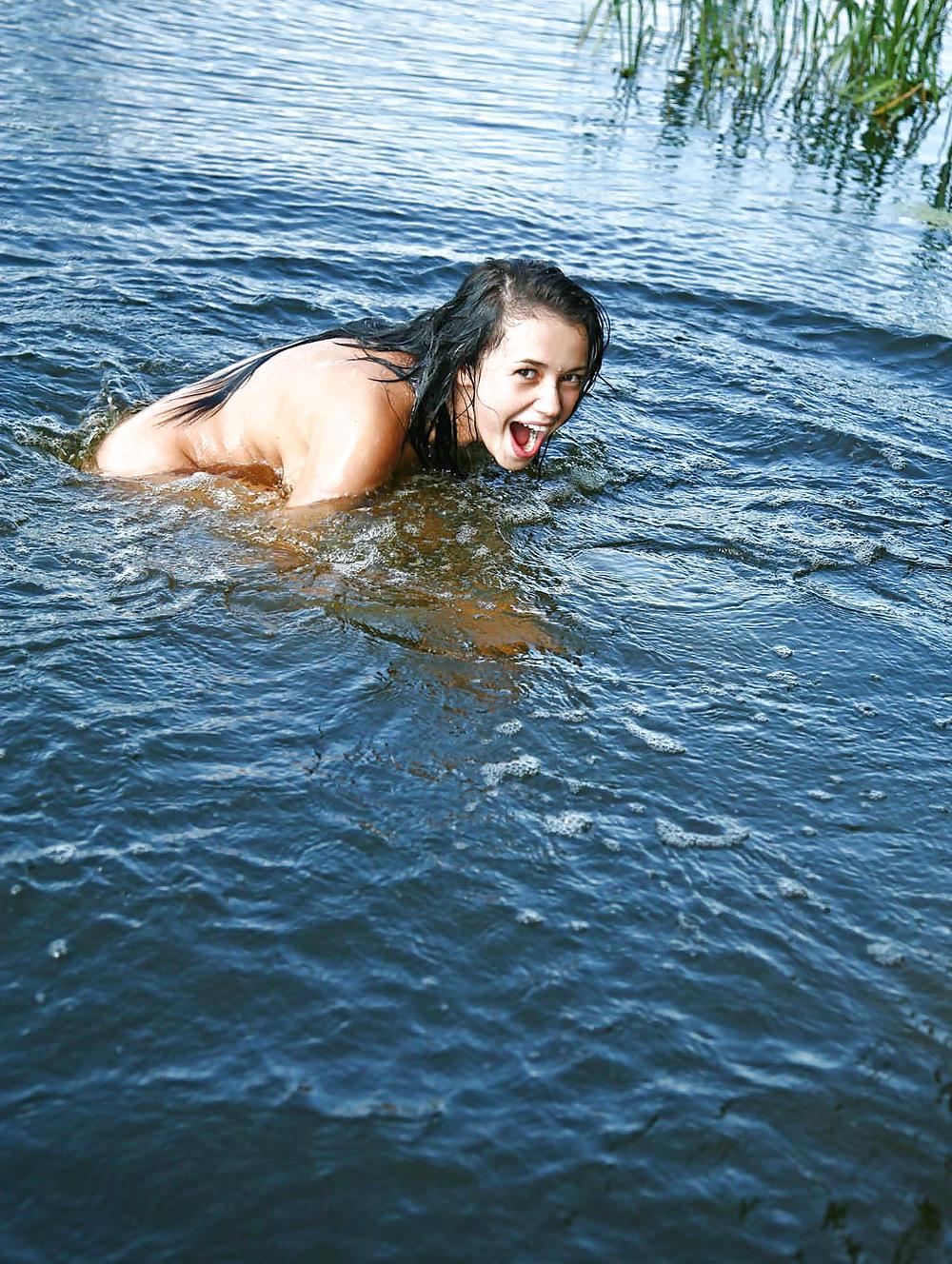20P Nudist girl at the lake.