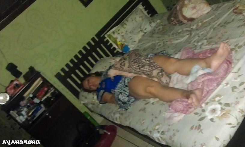 19P DESI BHABHI LAYING ON BED AND SHOW
