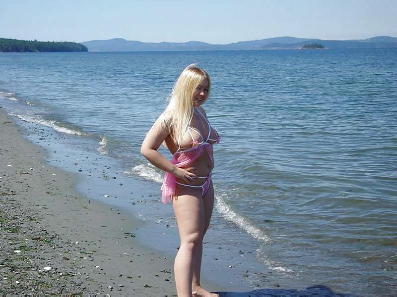12P Chubby blonde goes to the beach in a pink nightie