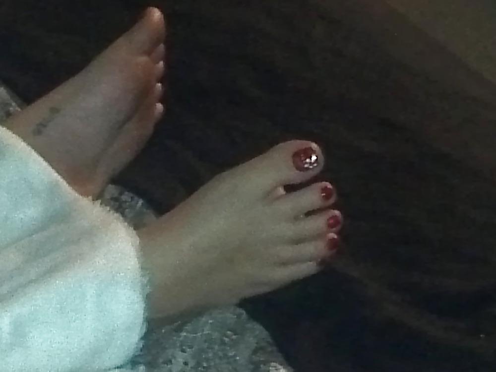 25P Wife doing a footjob on husband