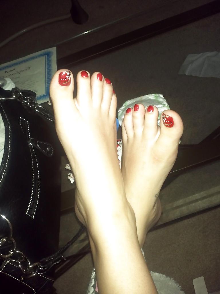 25P Wife doing a footjob on husband