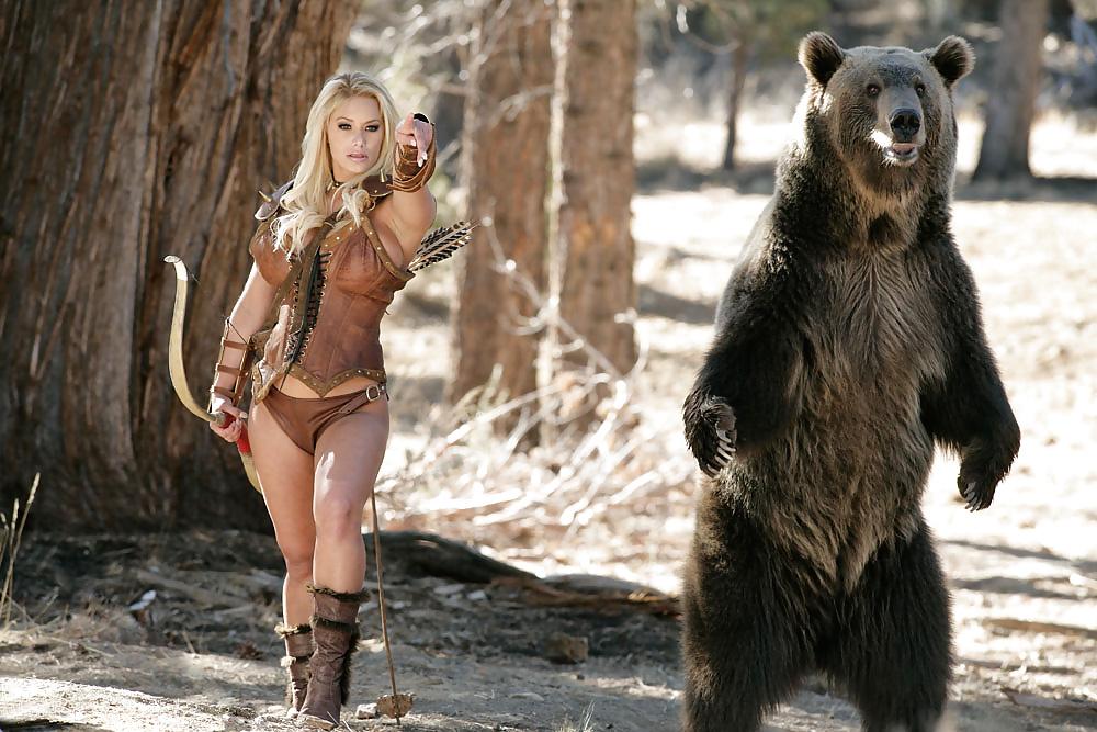 25P Busty hunter Shyla getting naked next to a Russian bear