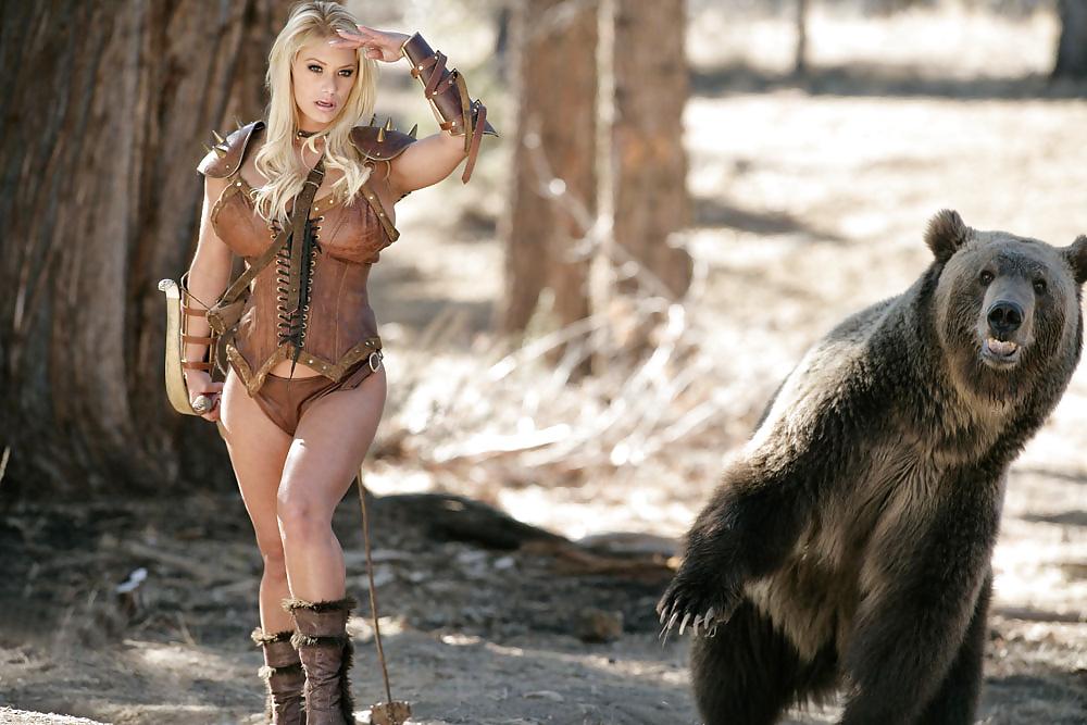 25P Busty hunter Shyla getting naked next to a Russian bear