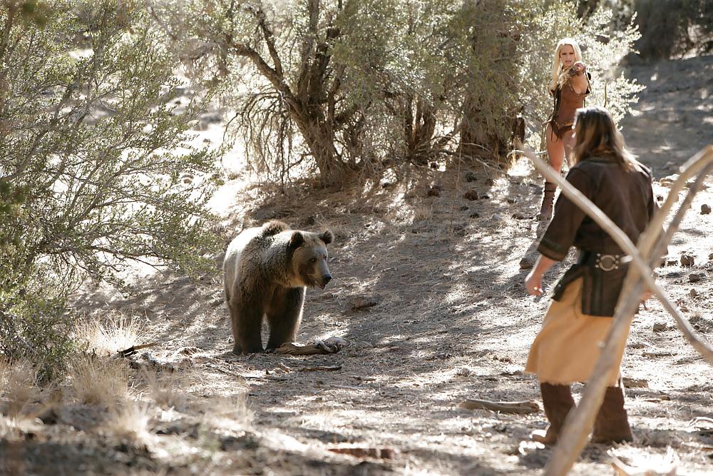25P Busty hunter Shyla getting naked next to a Russian bear