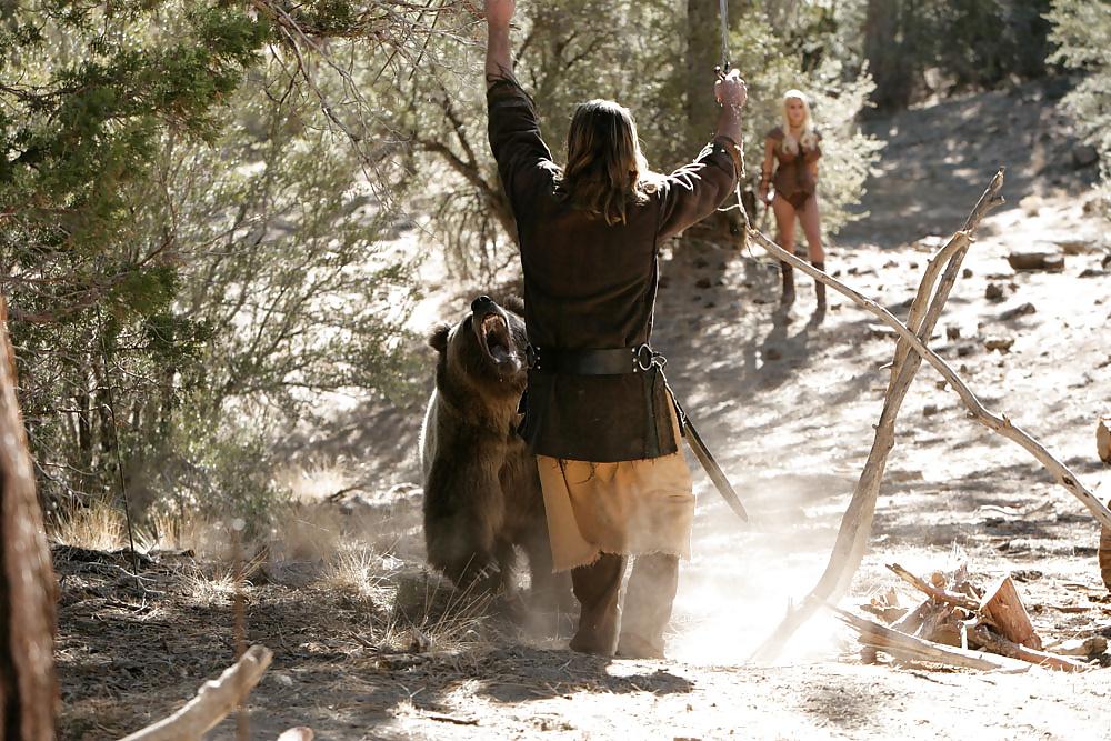 25P Busty hunter Shyla getting naked next to a Russian bear