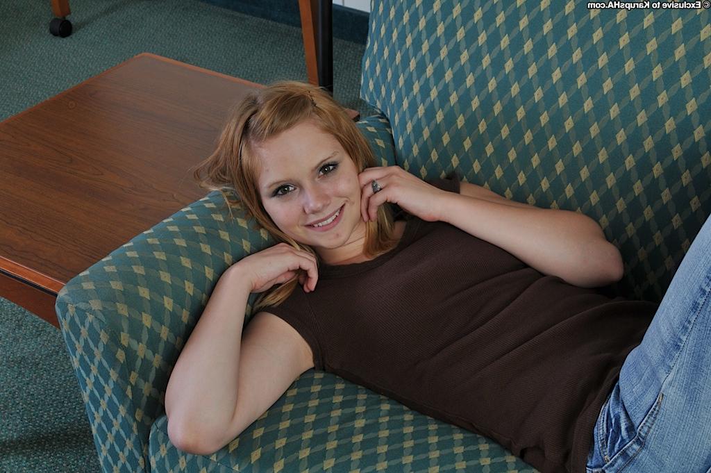16P Gorgeous teen beauty Brittny is showing her tight pussy on a couch