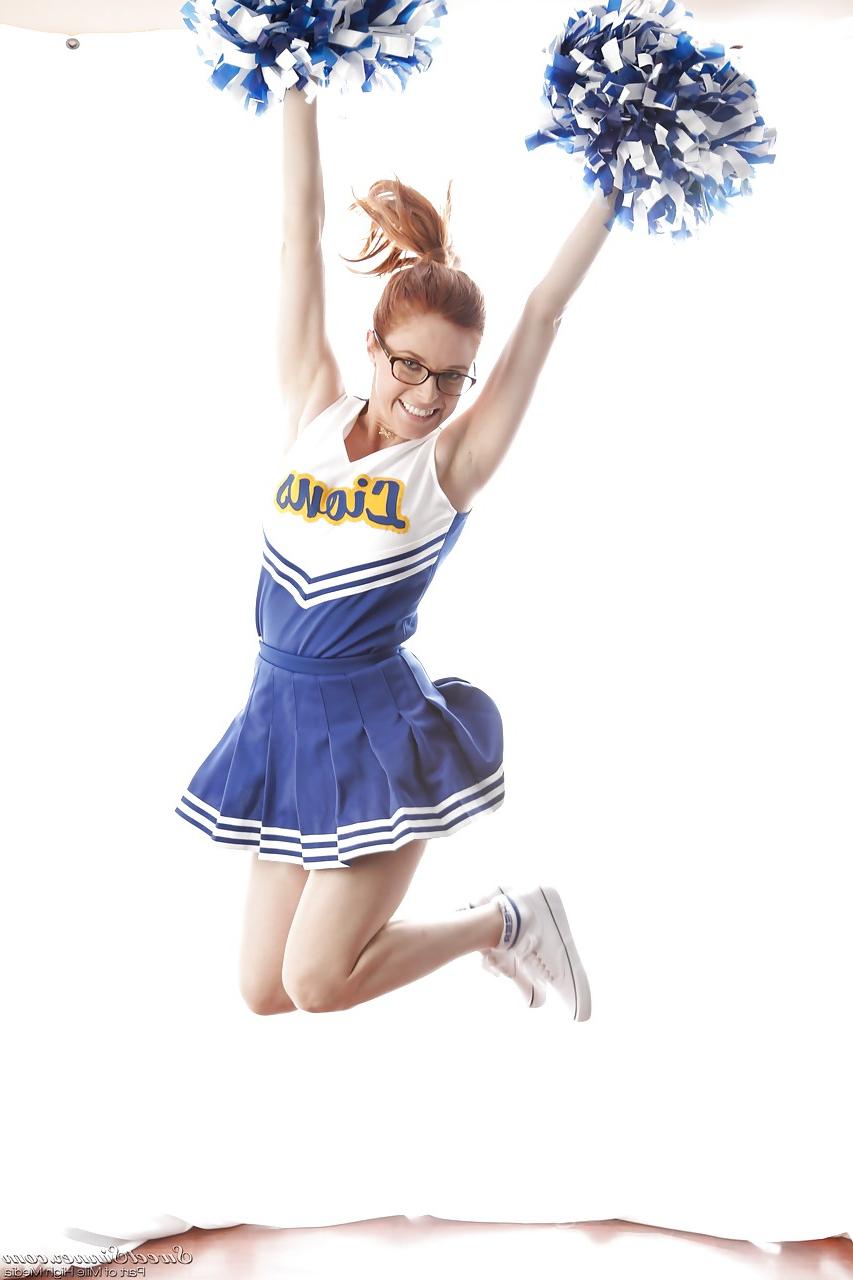15P Cute redhead cheerleader Penny Pax in glasses baring big tits & firm ass