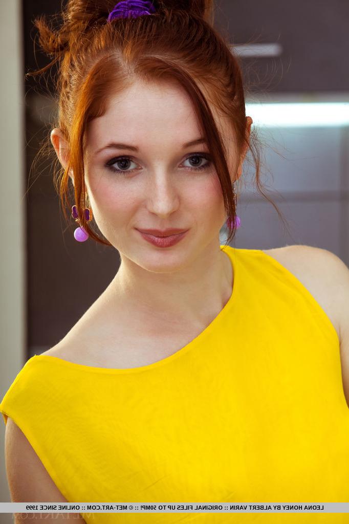 18P Redheaded teen babe Leona Honey baring nice ass and pussy for glam spread