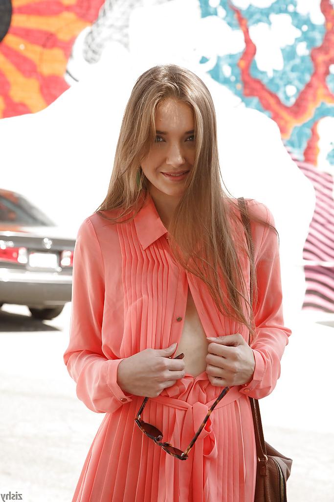 12P Innocent blue eyed amateur Maria Turova posing in clothes outside