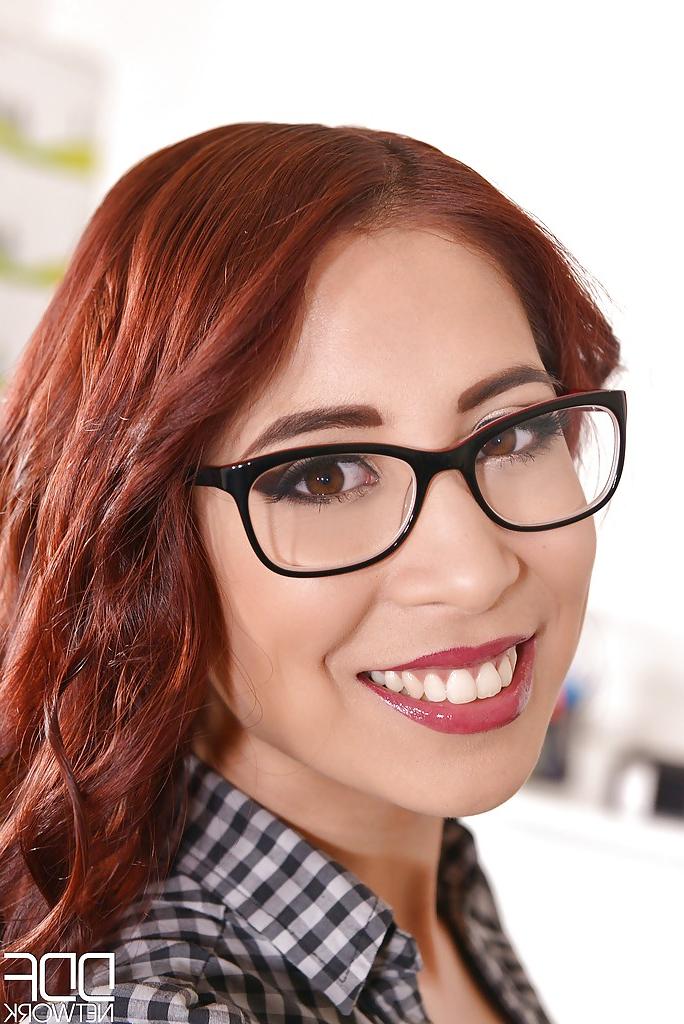 16P Redhead office worker Paula Shy finger fucking on desk wearing glasses