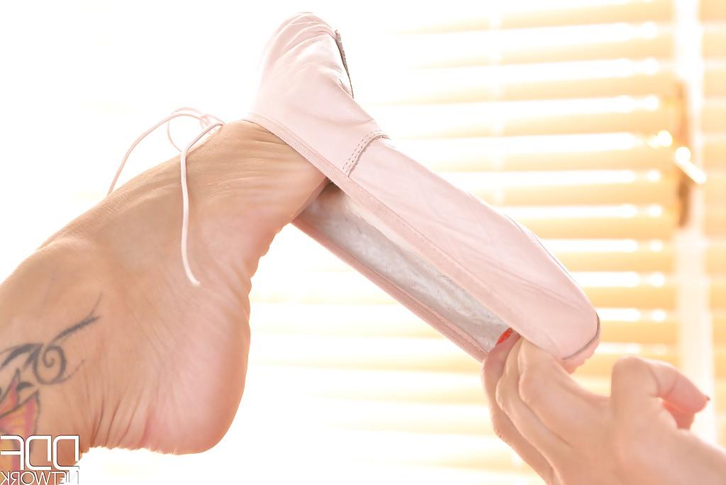 16P Flexible Euro babe Mea Melone showing off fine legs and sucking own toes