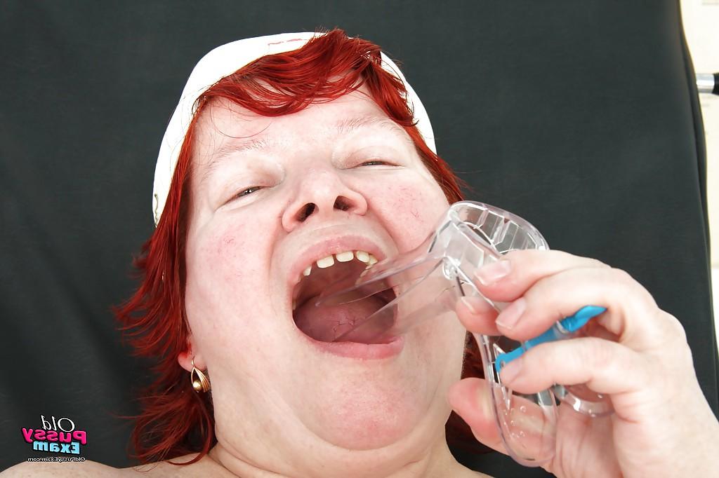 16P Fatty mature nurse taking off her uniform and toying her hairy vag