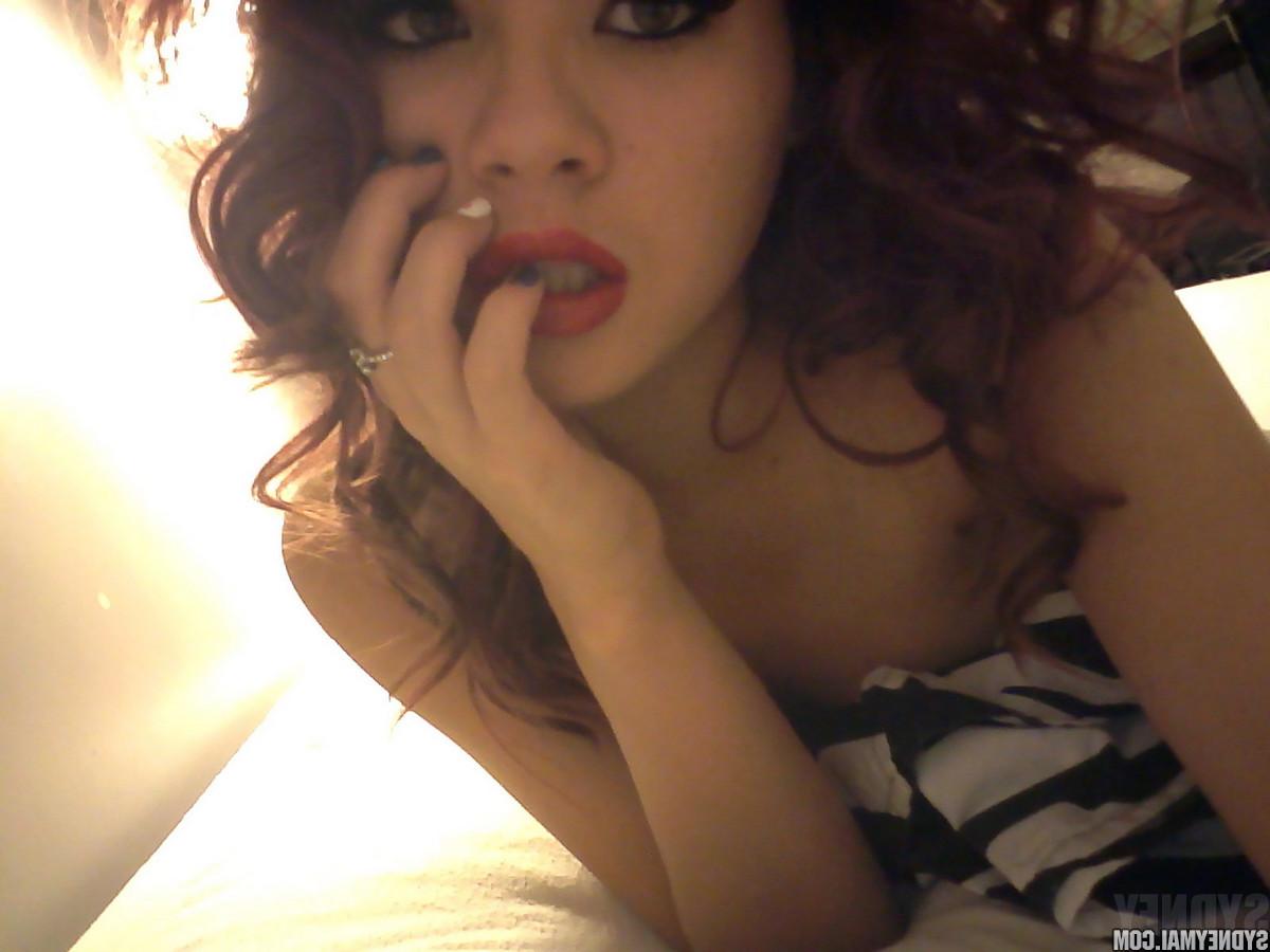 15P Ravishing amateur redhead Sydney Mai loves fingering her tight pussy