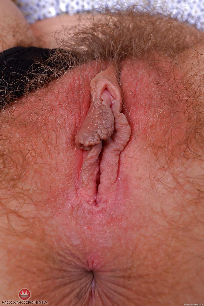 16P Older redhead Leona spreading hairy pink pussy after slipping thong off ass