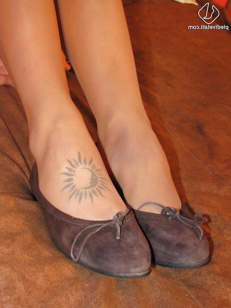 16P Cute babe Carla will gladly show you her cute tattoo on her foot